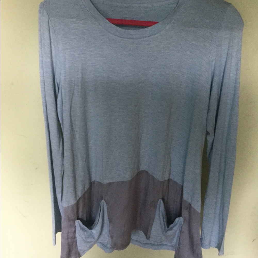 Logo by Lori Goldstein blue and Gray Top.